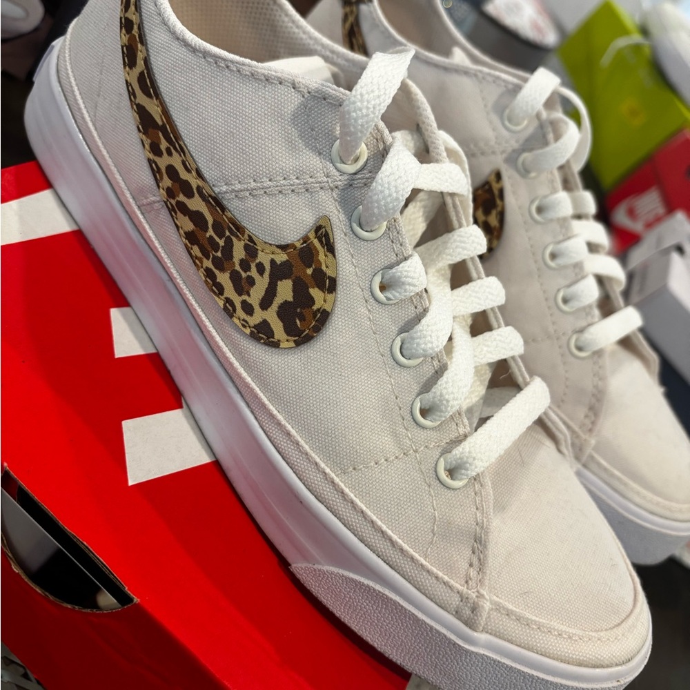 Nike Women’s White Low-Top Sneakers with Leopard Swoosh